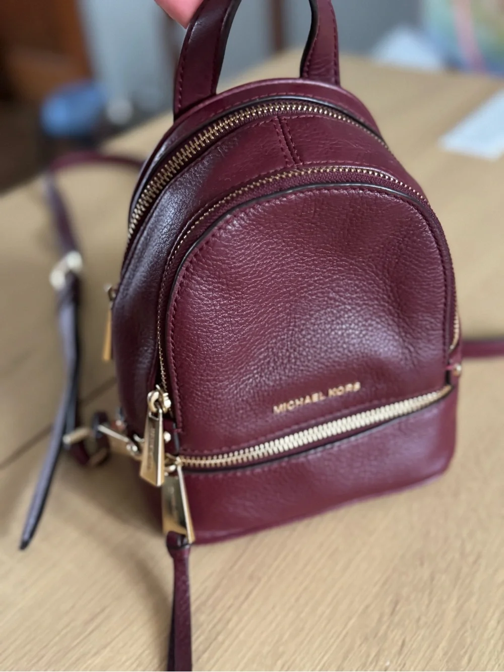 Michael Kors Burgundy Pebbled Leather Mini Backpack with Gold Hardware